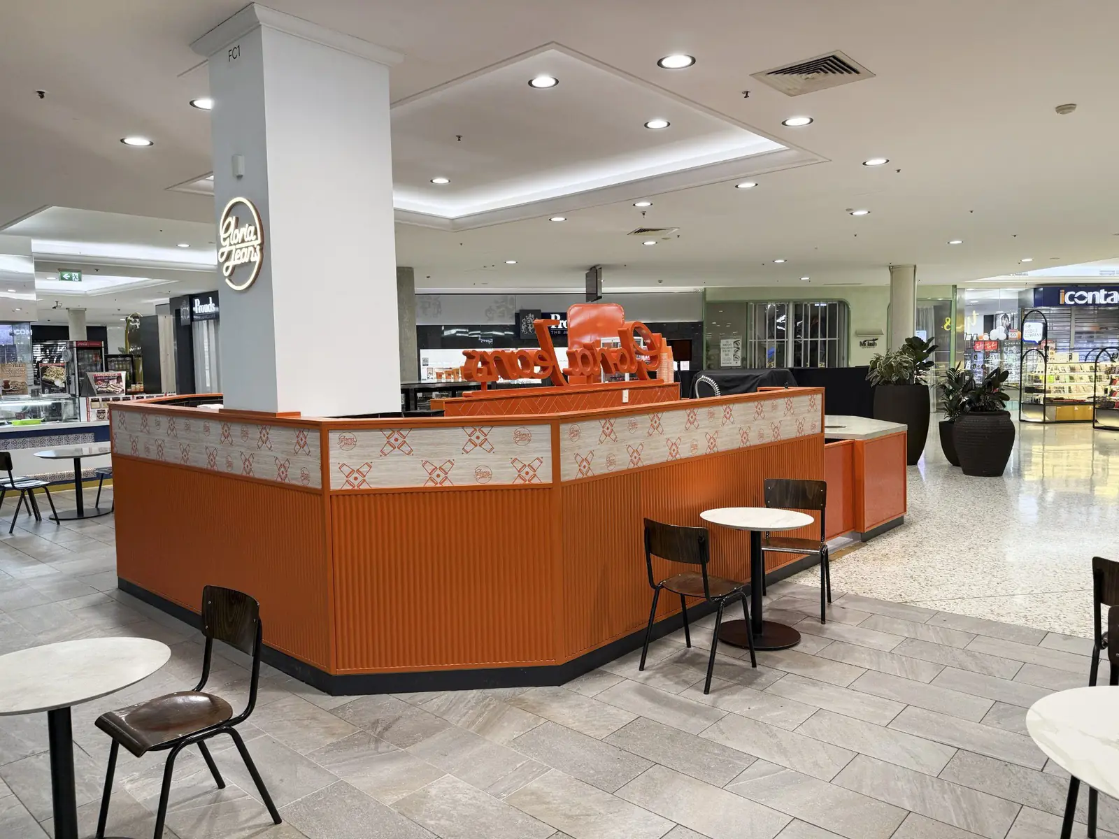 Fluted orange feature band on the Gloria Jean's Mt Druitt kiosk